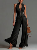 Vittoria · Black chiffon jumpsuit with V-neck, sleeveless, zip, pleated, wide-leg pants